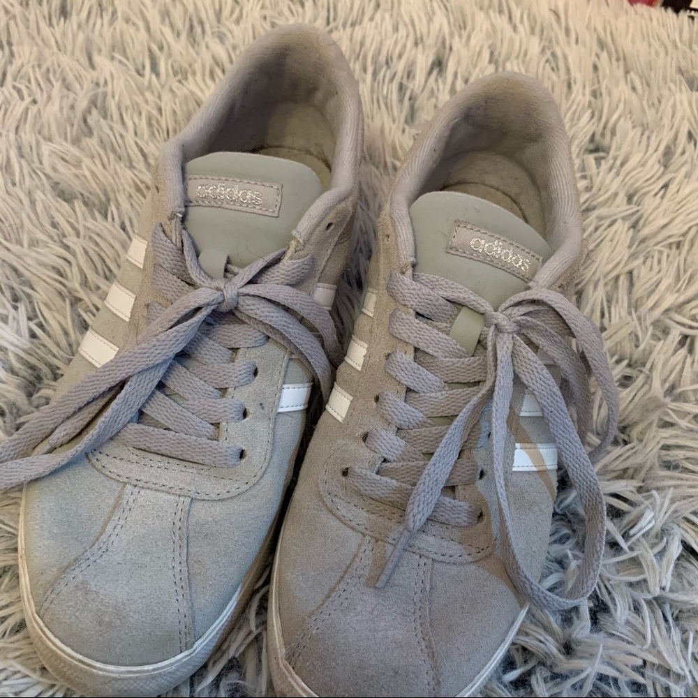 Grey Adidas athletic shoe